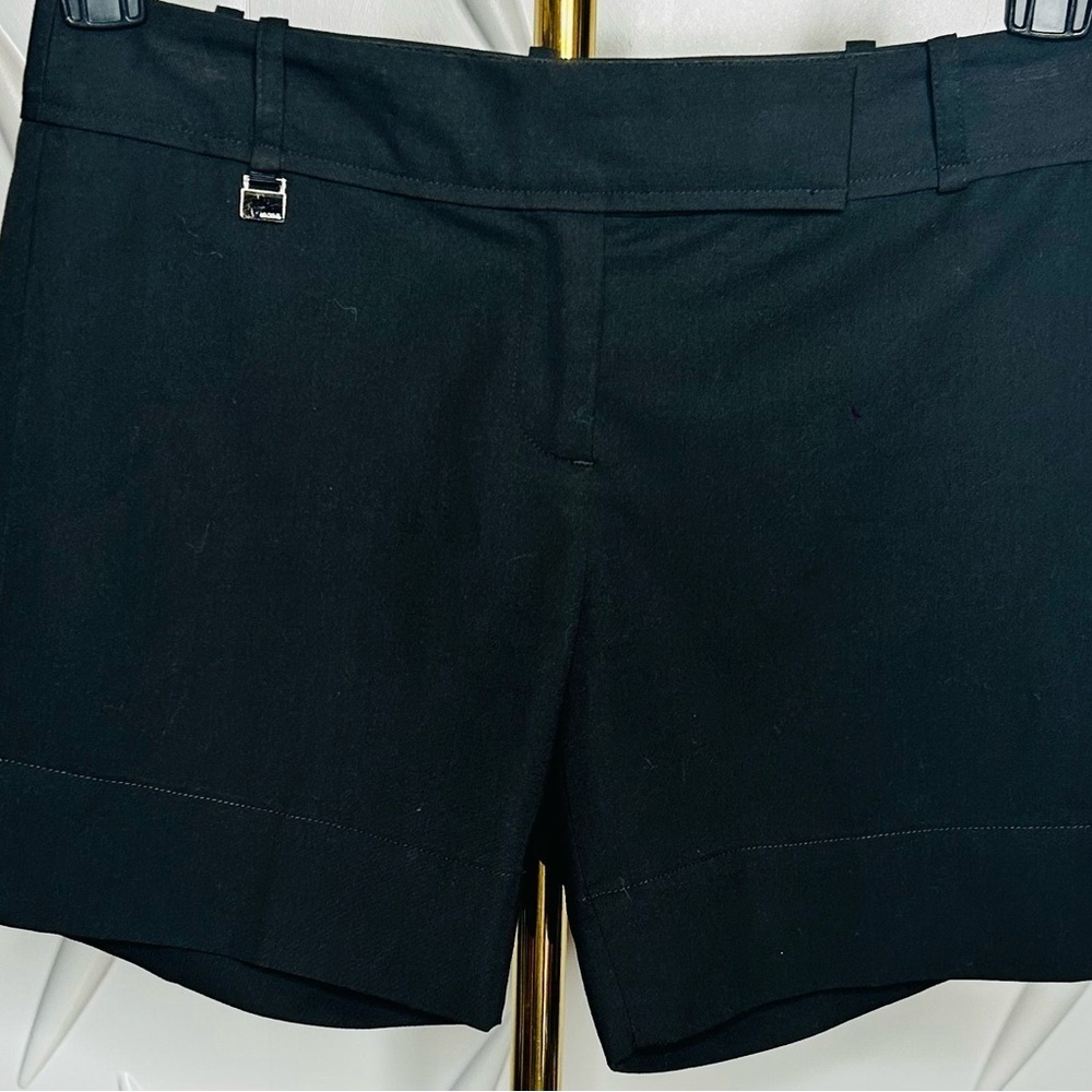 BCBGMaxazria SZ S black short with metallic logo charm at the waist, waist 28” - Picture 3 of 4
